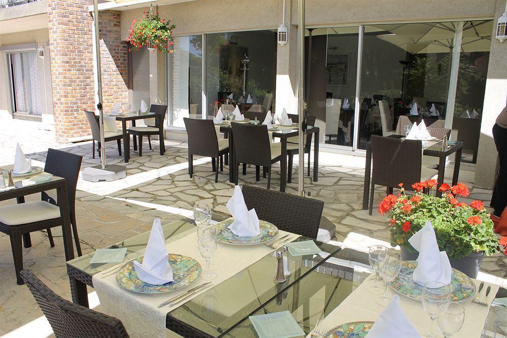 Logis Hotel & Restaurant - Le Relais De Montigny Монтиньи Экстерьер фото